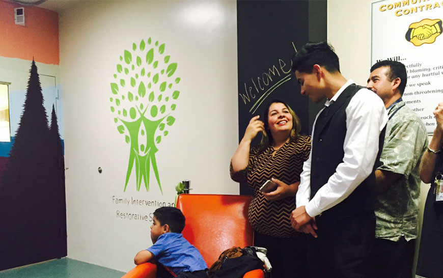 Image of Sergio Vera, 17, celebrating the opening of the FIRS Center