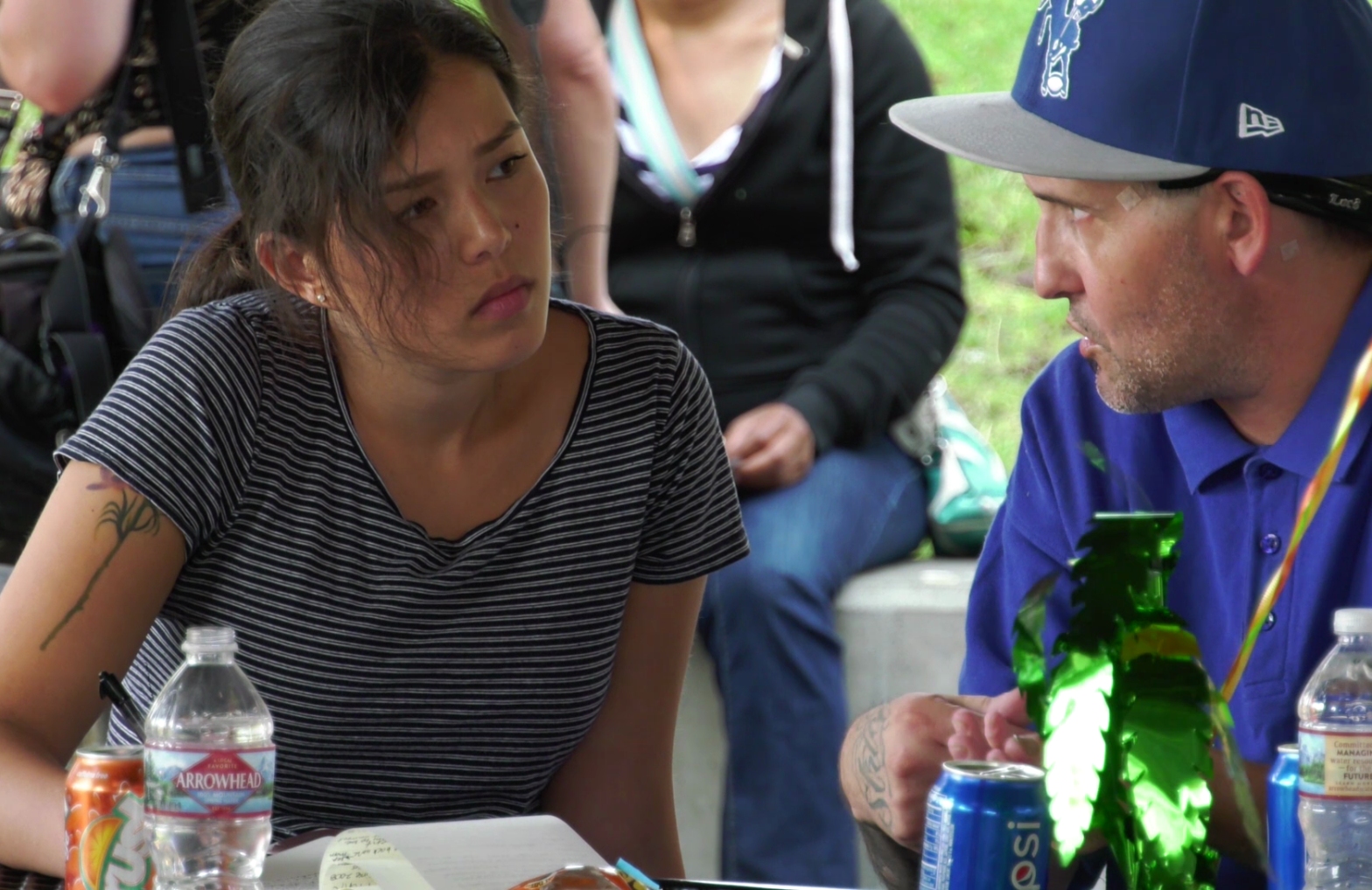 Image of two people talking at a King County event